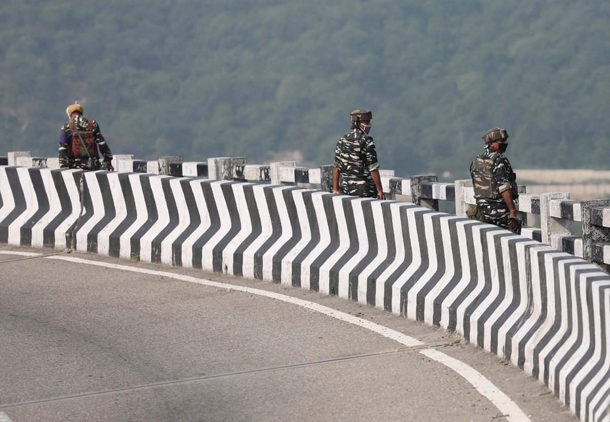 Paramilitary CRPF personnel patrol the Jammu-Srinagar Highway ahead of annual Amarnath yatra. Photos: Mir Imran/GK