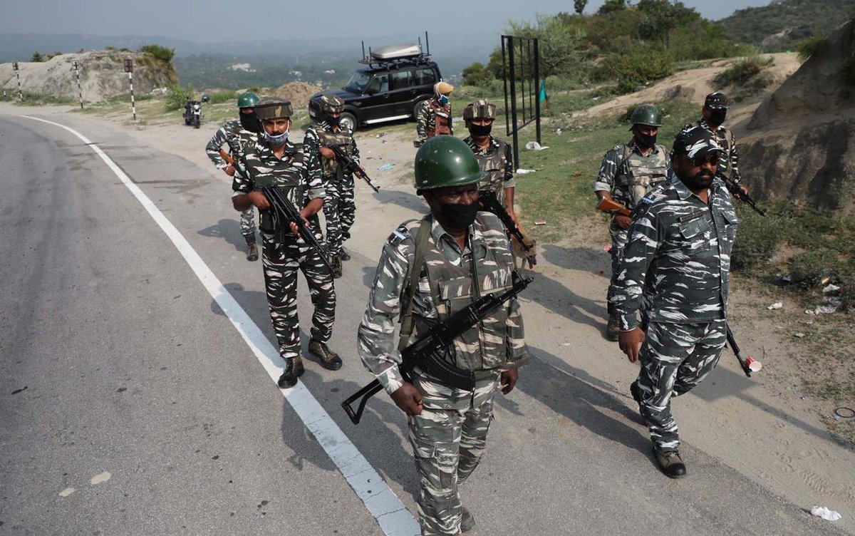 Paramilitary CRPF personnel patrol the Jammu-Srinagar Highway ahead of annual Amarnath yatra. Photos: Mir Imran/GK