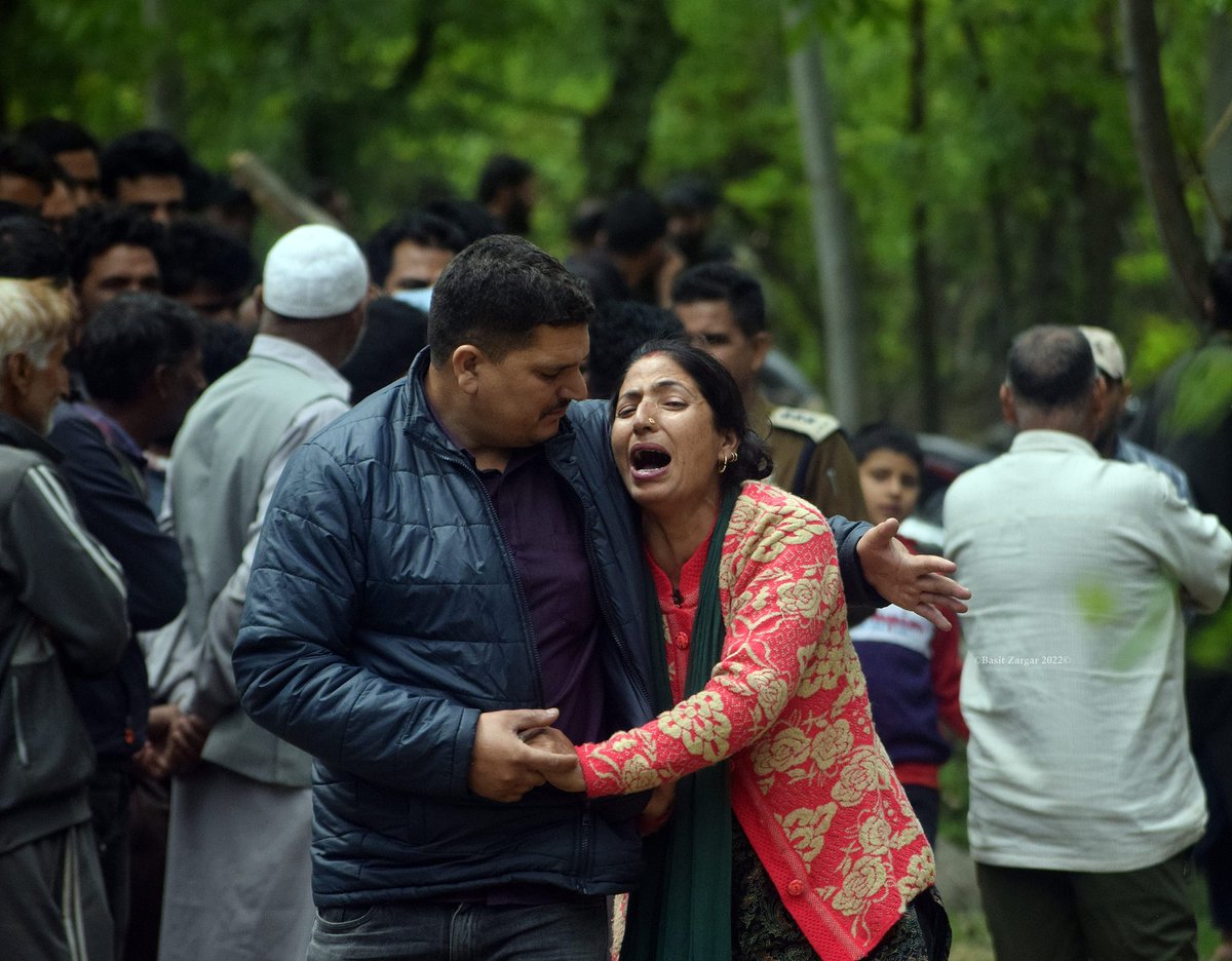 Amid sobs and tears, hundreds of people attended the last rites of Satish Singh, a Rajput who was killed by suspected militants outside his home in Kulgam