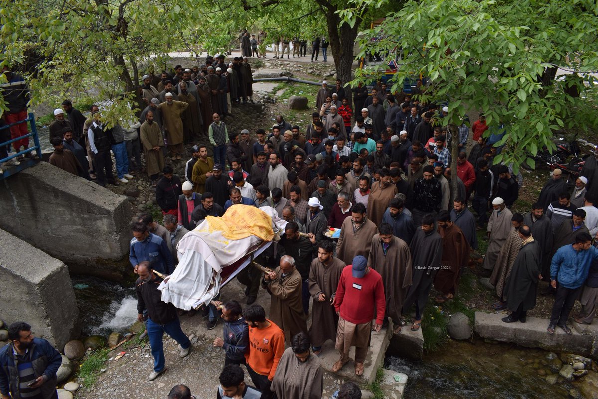 Amid sobs and tears, hundreds of people attended the last rites of Satish Singh, a Rajput who was killed by suspected militants outside his home in Kulgam