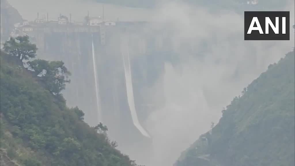 Two gates at the Baglihar Hydroelectric Power Project Dam built on the Chenab River in Ramban have been opened