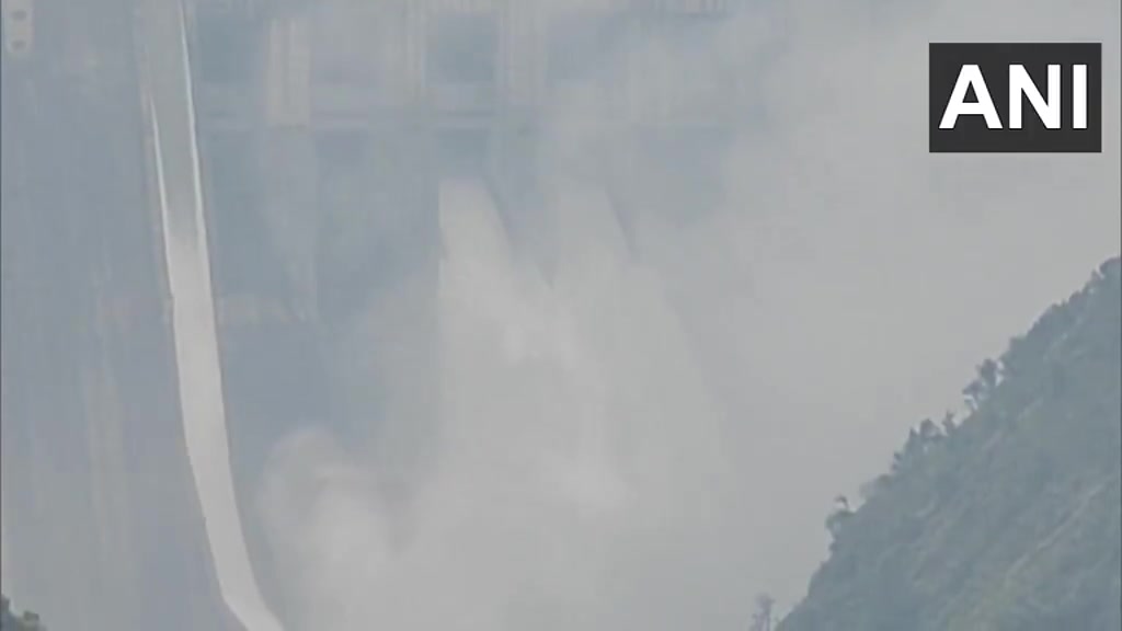Two gates at the Baglihar Hydroelectric Power Project Dam built on the Chenab River in Ramban have been opened