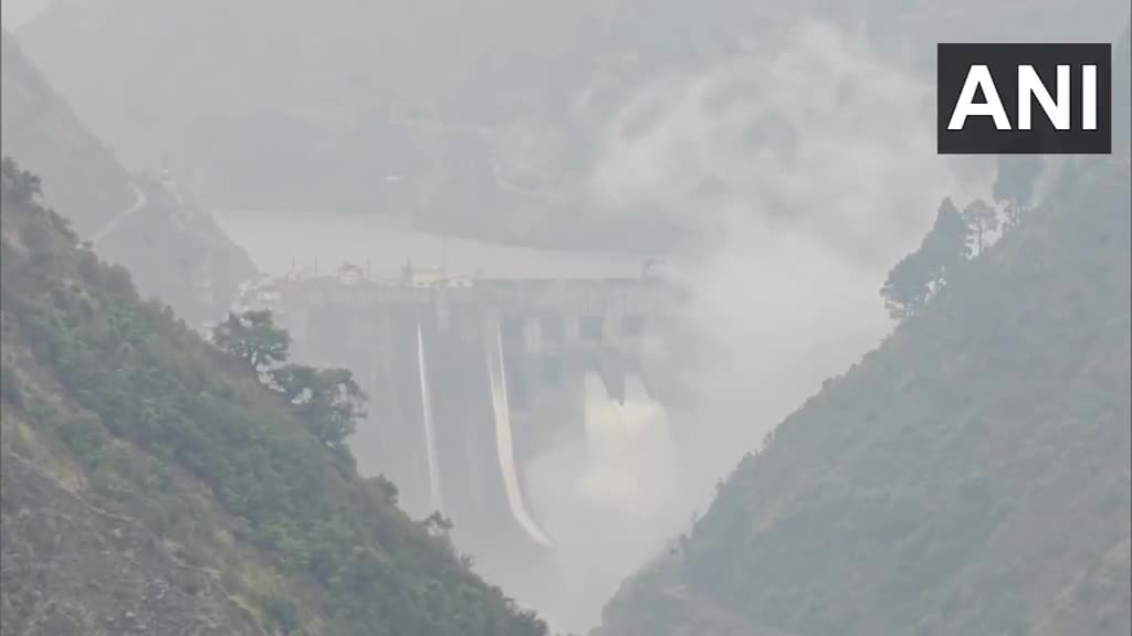 Two gates at the Baglihar Hydroelectric Power Project Dam built on the Chenab River in Ramban have been opened