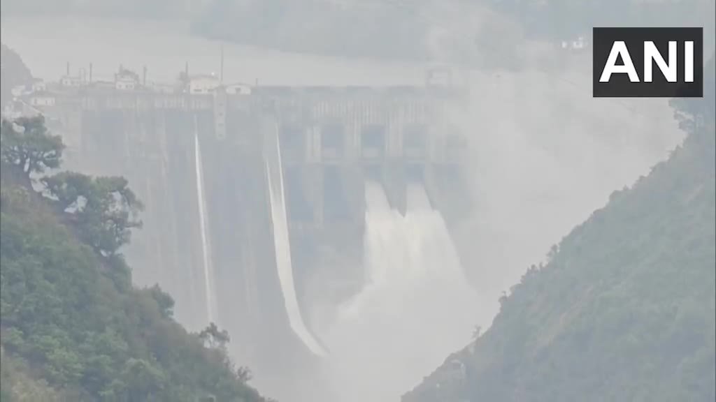 Two gates at the Baglihar Hydroelectric Power Project Dam built on the Chenab River in Ramban have been opened